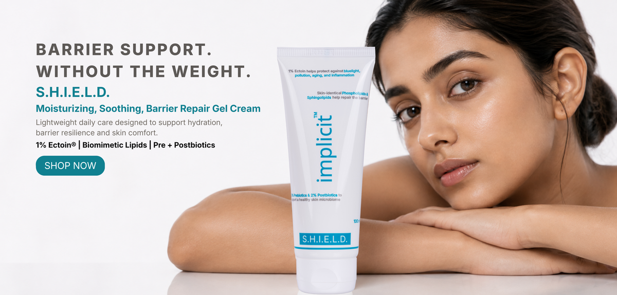 implicit S.H.I.E.L.D. daily barrier support gel cream tube on an aqua-blue background with molecular graphics.