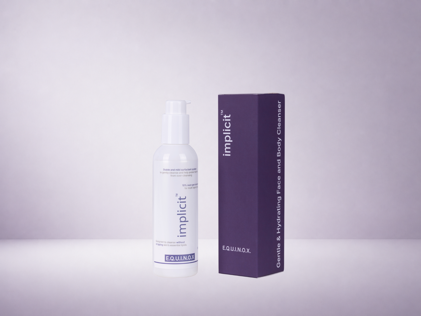 implicit™ E.Q.U.I.N.O.X. gentle face and body cleanser bottle displayed beside its purple product box on a soft lavender background.