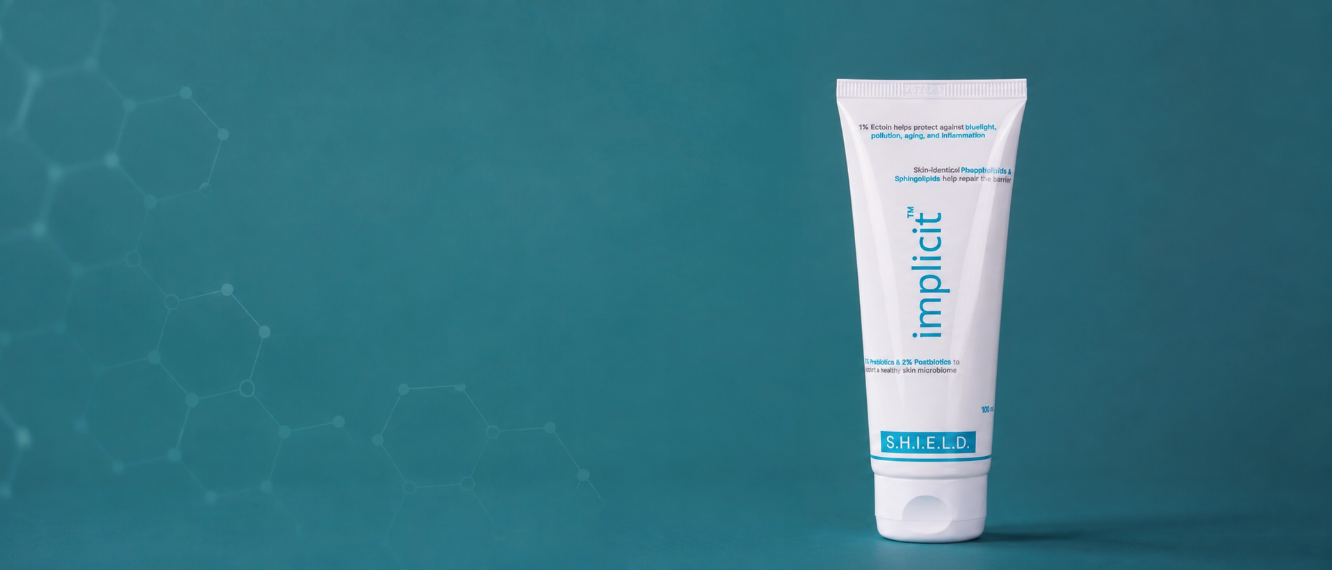 implicit™ S.H.I.E.L.D. daily barrier support gel cream tube on an aqua-blue background with molecular graphics.