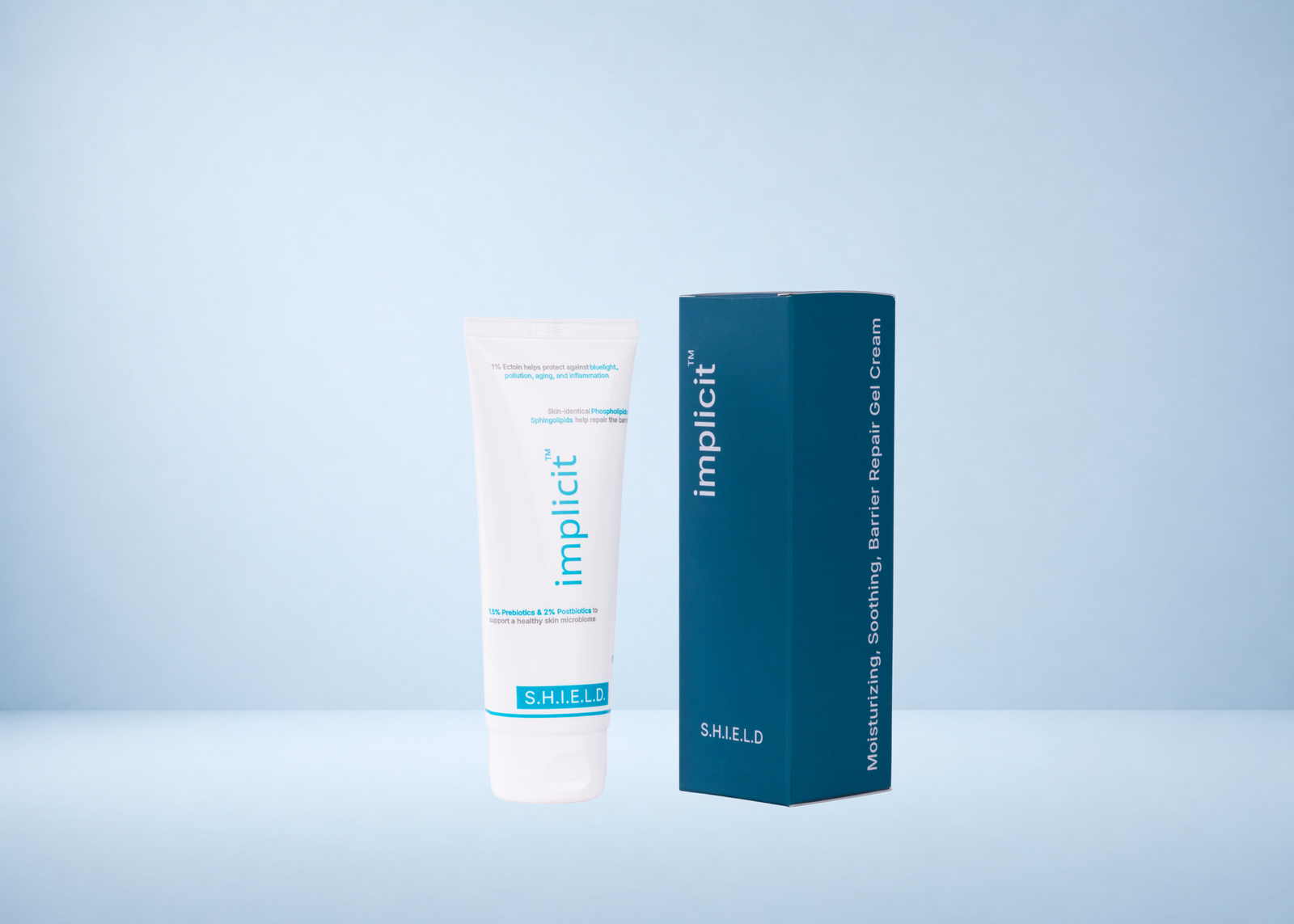 implicit™ S.H.I.E.L.D. barrier-support gel cream tube displayed beside its teal product box on a pale blue background.